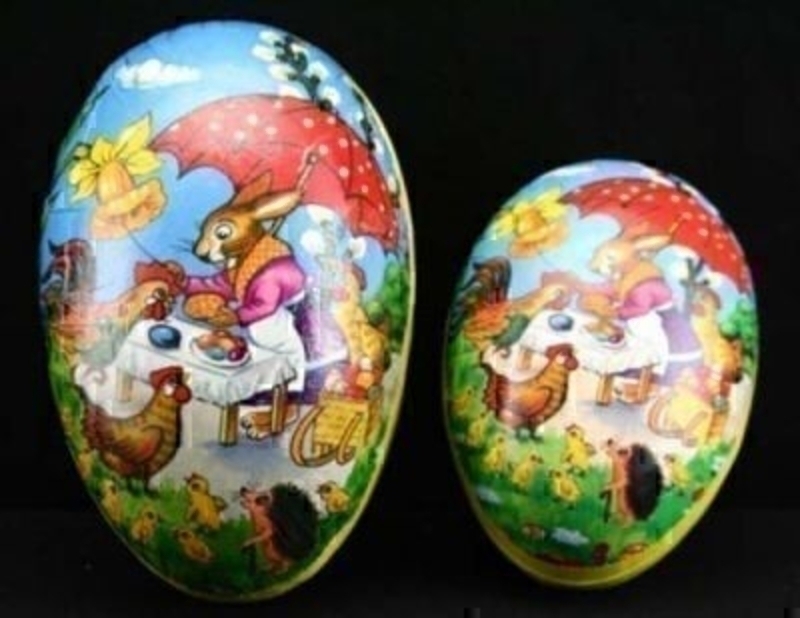 Easter Scene Egg Box Set of 2 by Gisela Graham. A set of 2 hollow egg gift boxes with a beautiful Easter scene of rabbits and chickens. Sizes 15x9x10cm, 12x7.5x8cm